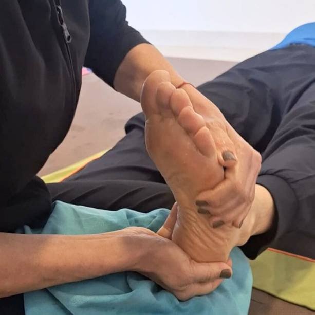 massagem relaxante no pé